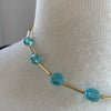 “Lumiere” Light Azure Crystal and Gold Necklace by SJ Mack Design